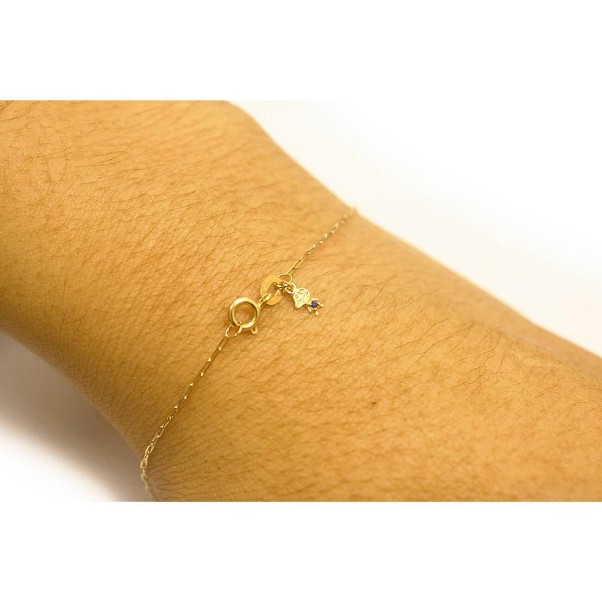 987909_pulseira-ouro-18k-cartier-c-pingente-menino-185cm-065